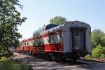 Two red and gray Northern Sky Charters cars on the tail of No. 7 today